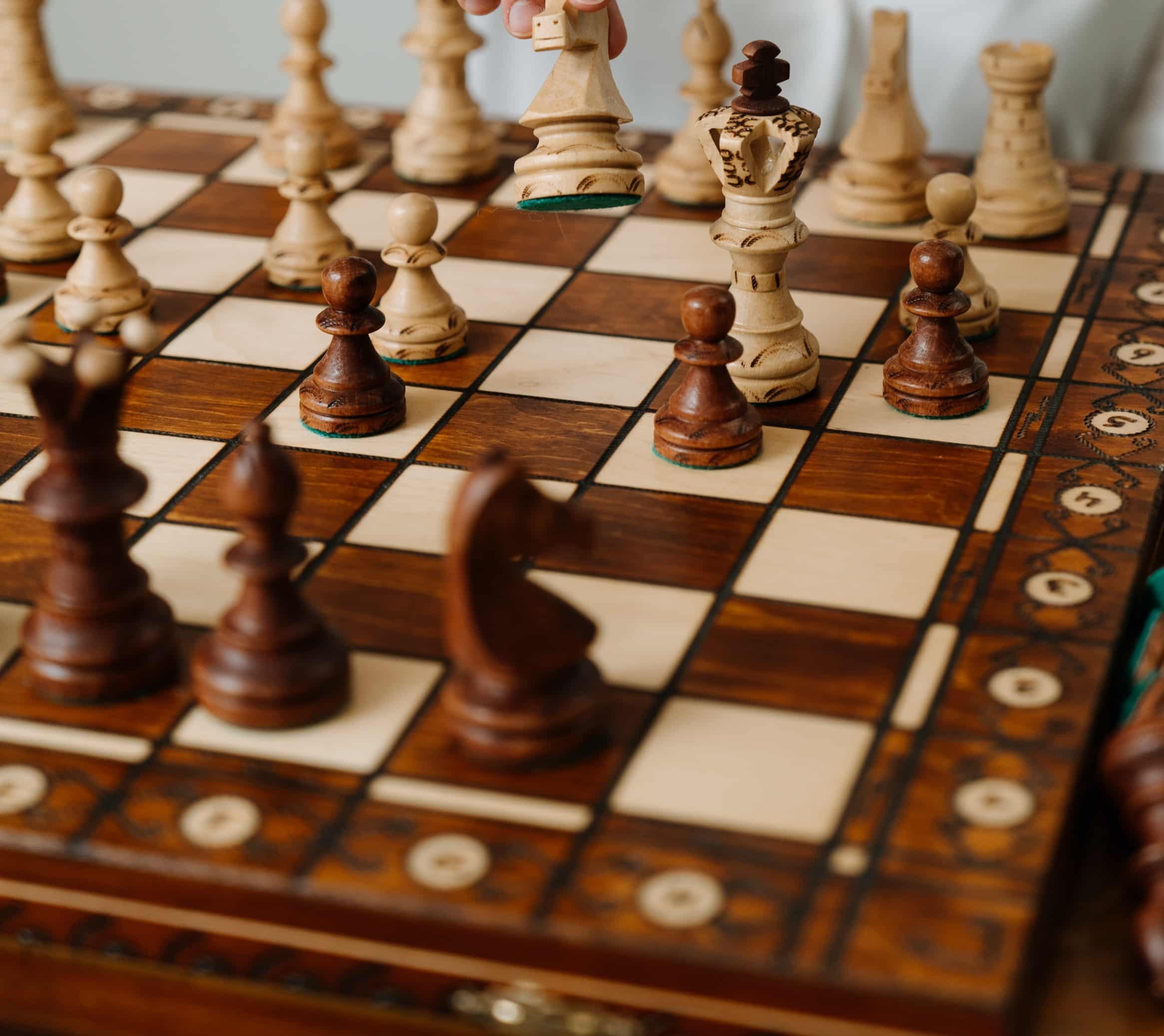 image of a chess board to represent the strategy involved in law